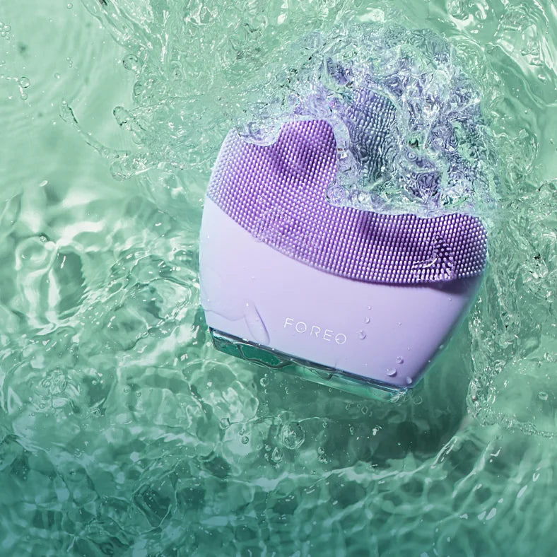 Travel-friendly facial brush for cleaning and massaging